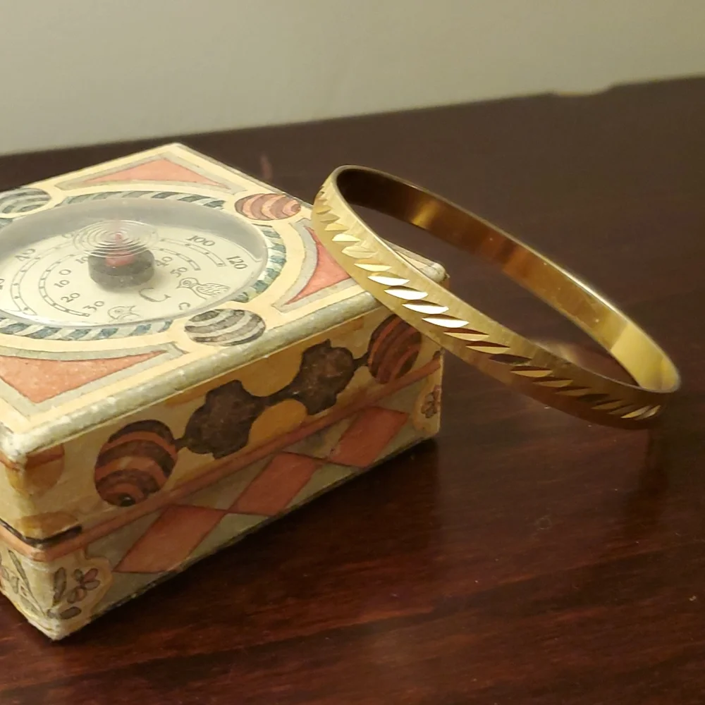 MONET Gold Tone Etched Bangle Bracelet
